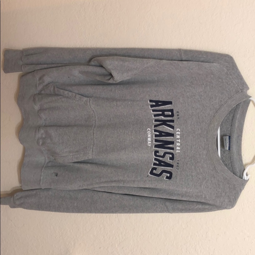 Distressed oversized crew neck pull over